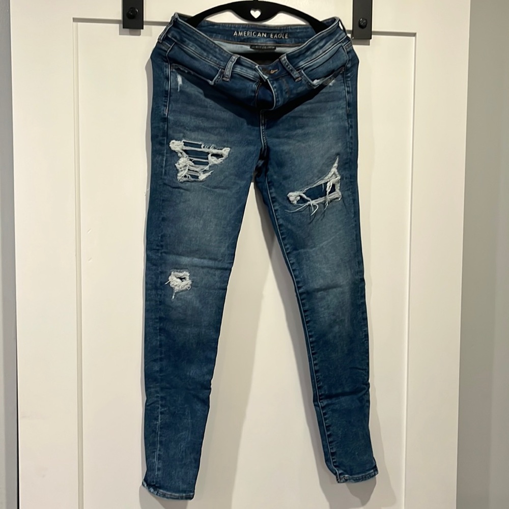 Jeans ripped legs
